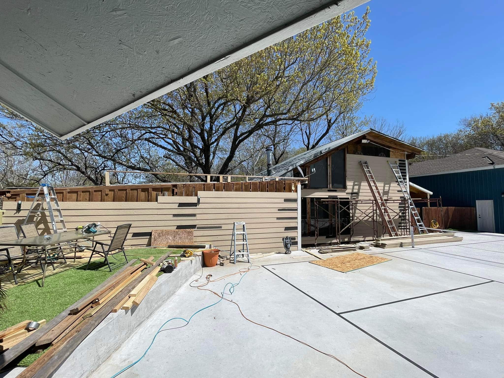 New siding being added to a home in Texas.